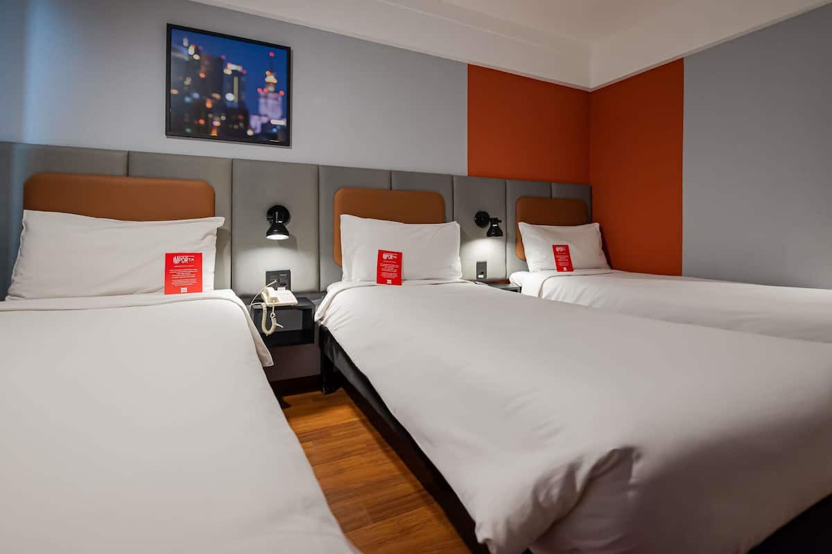 Standard Triple Room, 3 Twin Beds | Minibar, in-room safe, desk, iron/ironing board