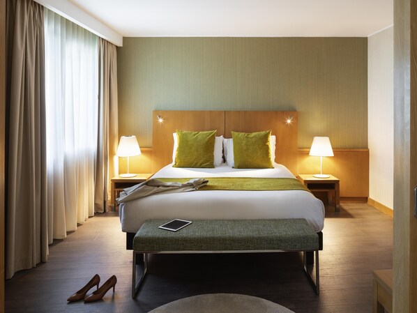 Hypo-allergenic bedding, down duvets, minibar, in-room safe