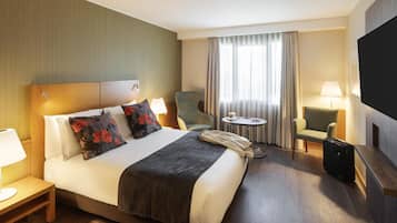 Hypo-allergenic bedding, down comforters, minibar, in-room safe