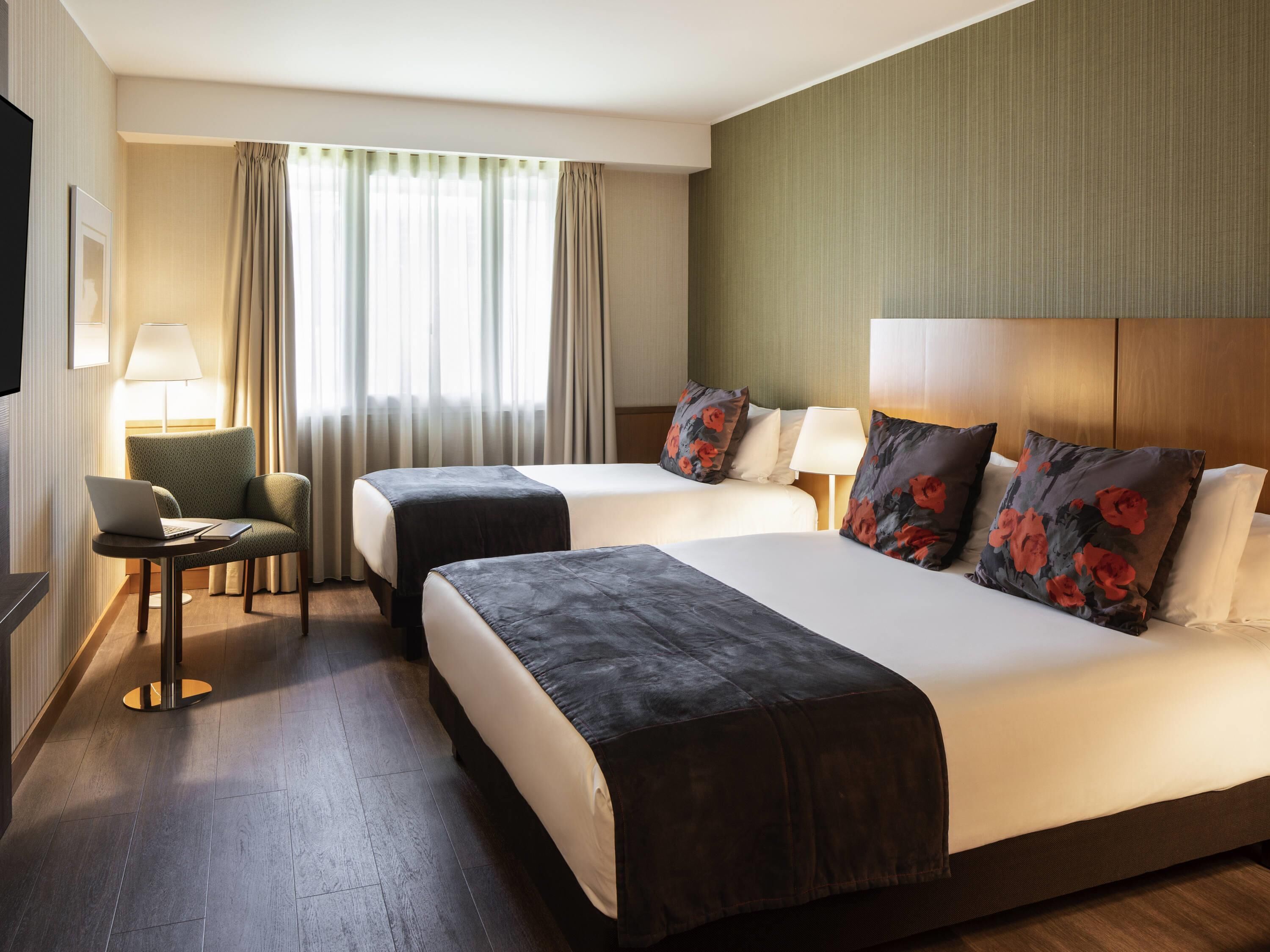 Standard Room, Multiple Beds | Hypo-allergenic bedding available, down comforters, minibar