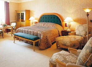 Minibar, in-room safe, individually decorated, desk