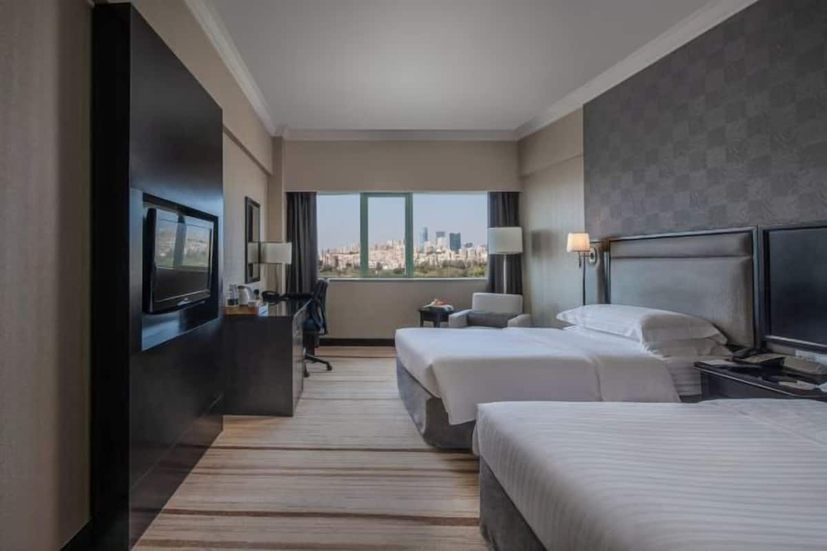 Premium bedding, down comforters, in-room safe, desk