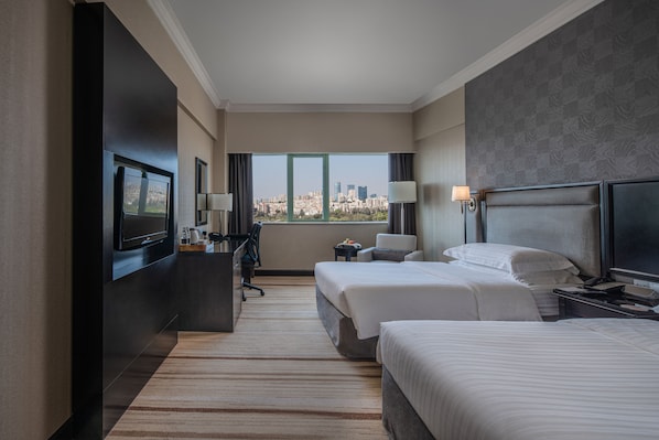 Chambre Deluxe | Literie de qualité, couette en duvet, minibar, coffre-fort