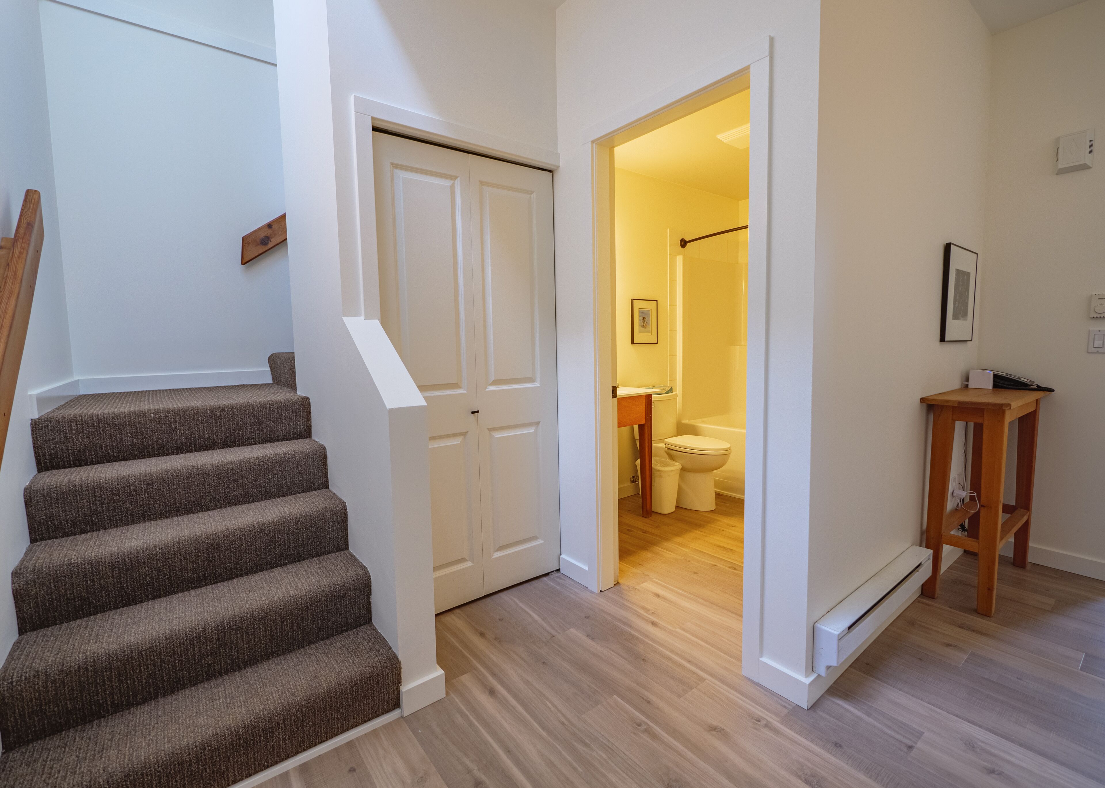 signature collection 2 bedroom king suite with sofa bed, full kitchen + harbour view | premium bedding, down duvets, individually decorated