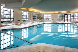 Indoor pool, open 7:00 AM to 11:00 PM, pool loungers