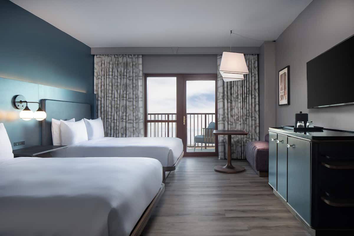 Hypo-allergenic bedding, pillowtop beds, in-room safe, desk