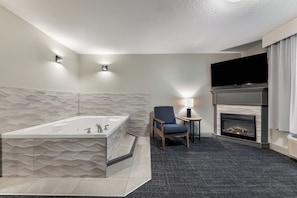 Suite, 1 King Bed, Non Smoking, Hot Tub | Premium bedding, laptop workspace, iron/ironing board, WiFi (free) - Days Inn & Suites by Wyndham Thunder Bay (Thunder Bay)