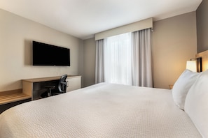 Suite, 1 King Bed, Non Smoking | Premium bedding, laptop workspace, iron/ironing board, WiFi (free) - Days Inn & Suites by Wyndham Thunder Bay (Thunder Bay)