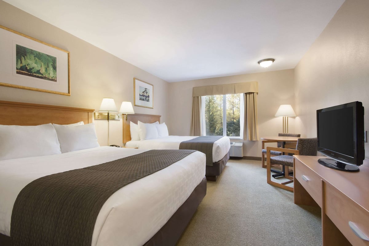 standard room, 2 queen beds, non smoking | premium bedding, laptop workspace, iron/ironing board, free wifi