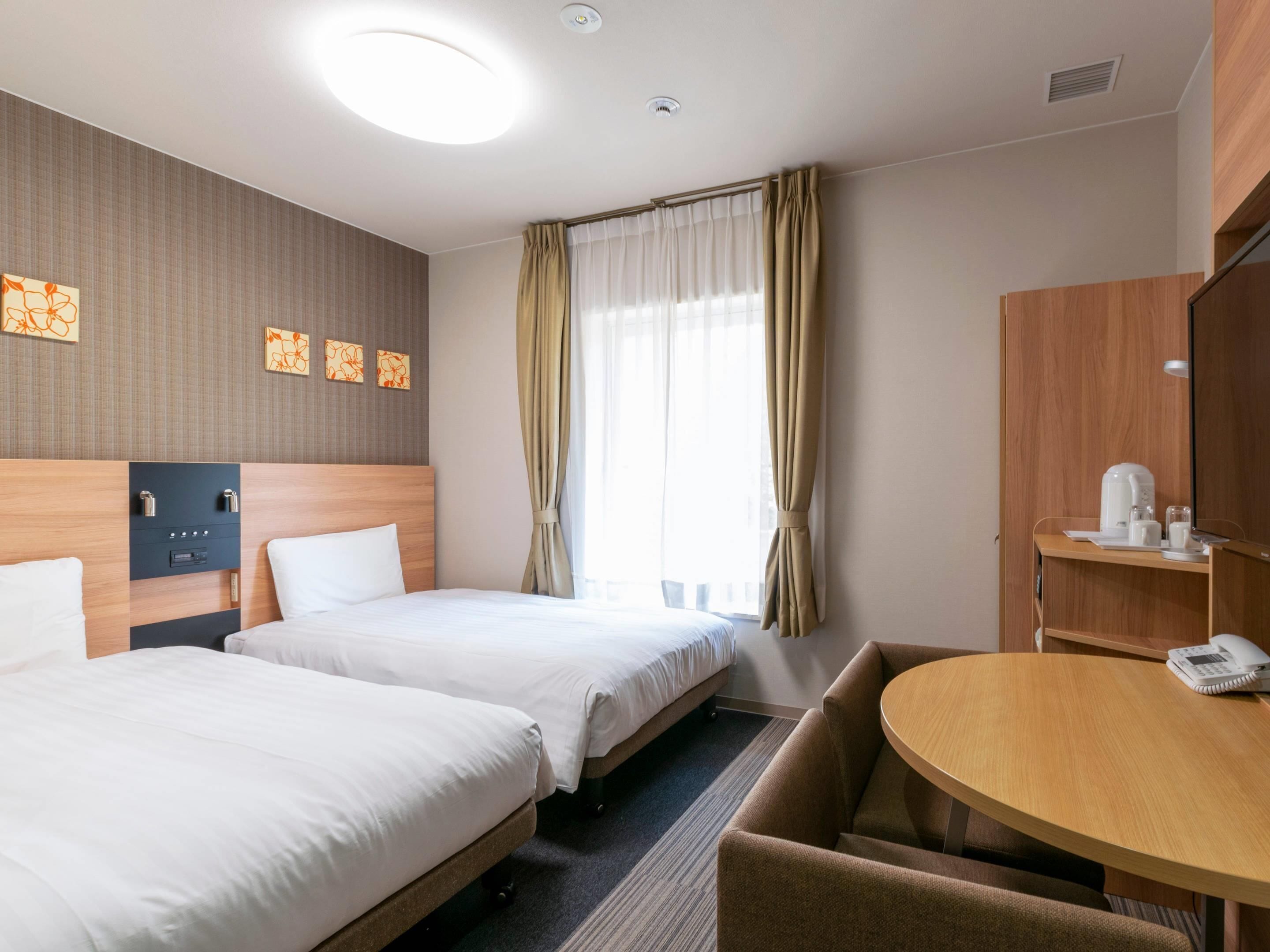 Premium bedding, desk, blackout drapes, iron/ironing board