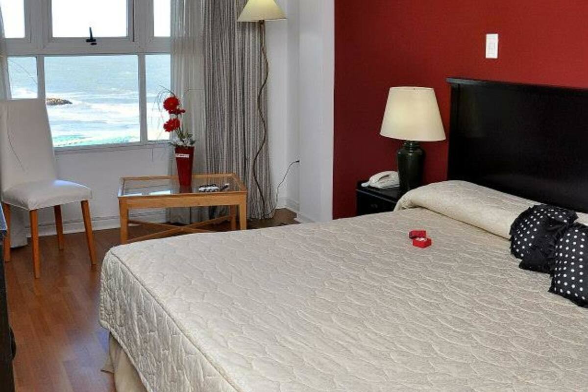 Standard Room, 1 Queen Bed, Ocean View | Minibar, in-room safe, desk, iron/ironing board (on request)