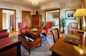Suite | Living area | 40-inch Smart TV with satellite channels, iPad, pay films - Golden Well Hotel (Prague)