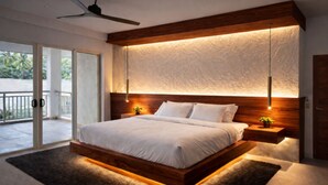 A modern bedroom with a wooden bed frame, a large window, and a ceiling fan. - Paradise Links Resort Port Douglas (Craiglie)