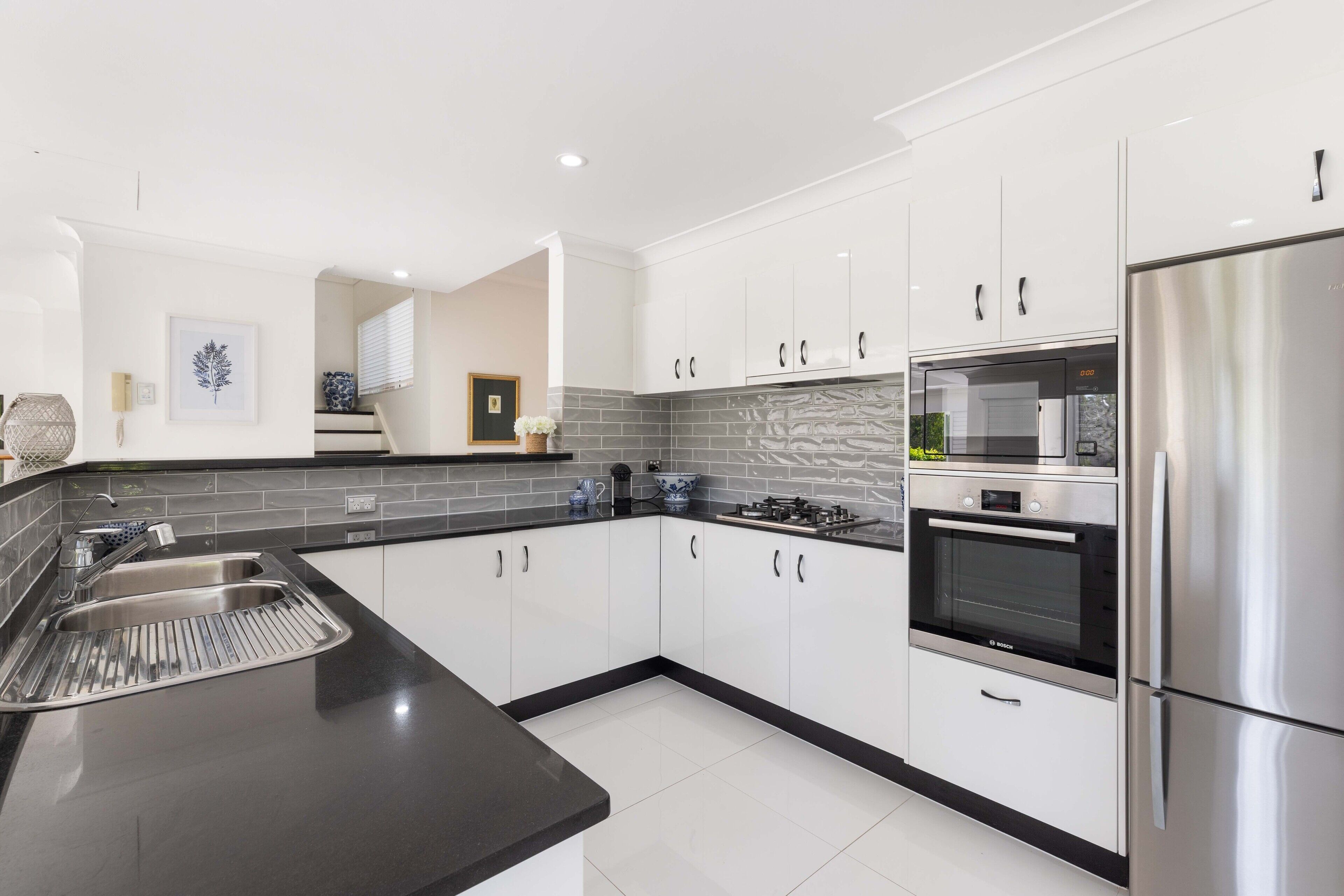 villa palmier | private kitchen | espresso maker, electric kettle, toaster, cleaning supplies