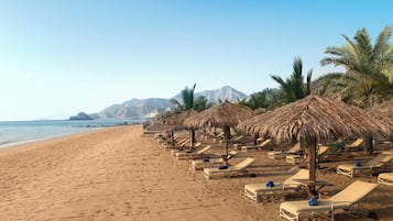 Private beach, sun loungers, beach umbrellas, beach towels