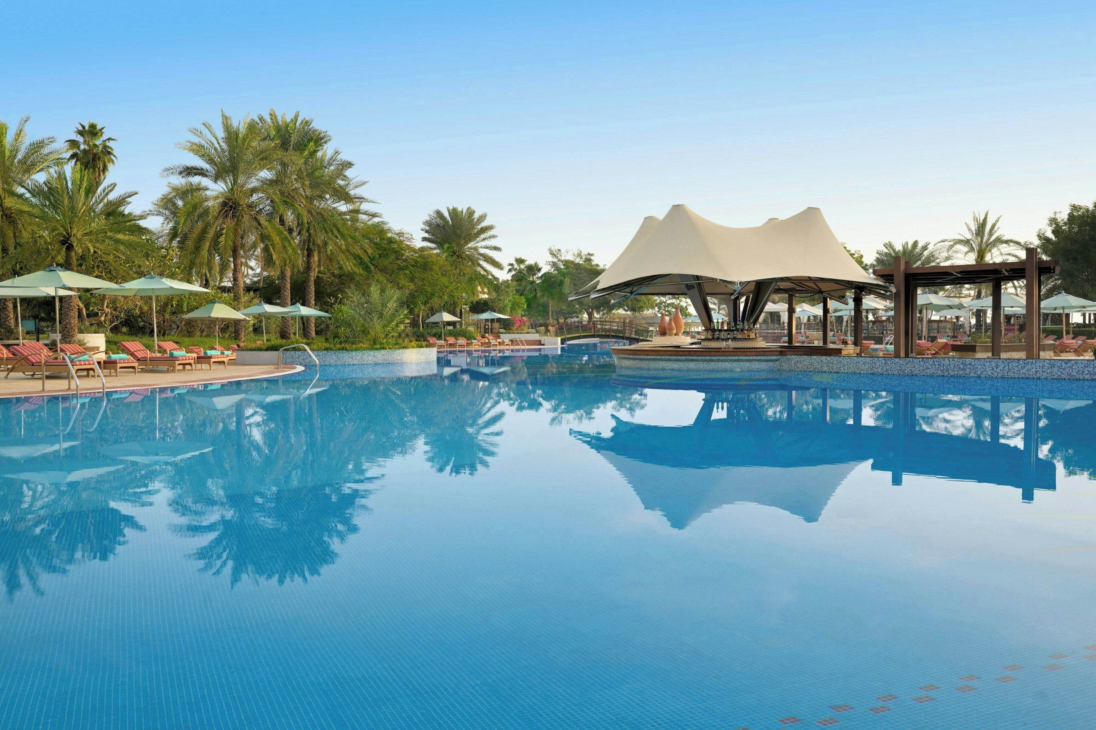 2 outdoor pools, open 10:00 AM to 7:00 PM, pool umbrellas, pool loungers