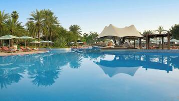 2 outdoor pools, open 10:00 AM to 7:00 PM, pool umbrellas, pool loungers
