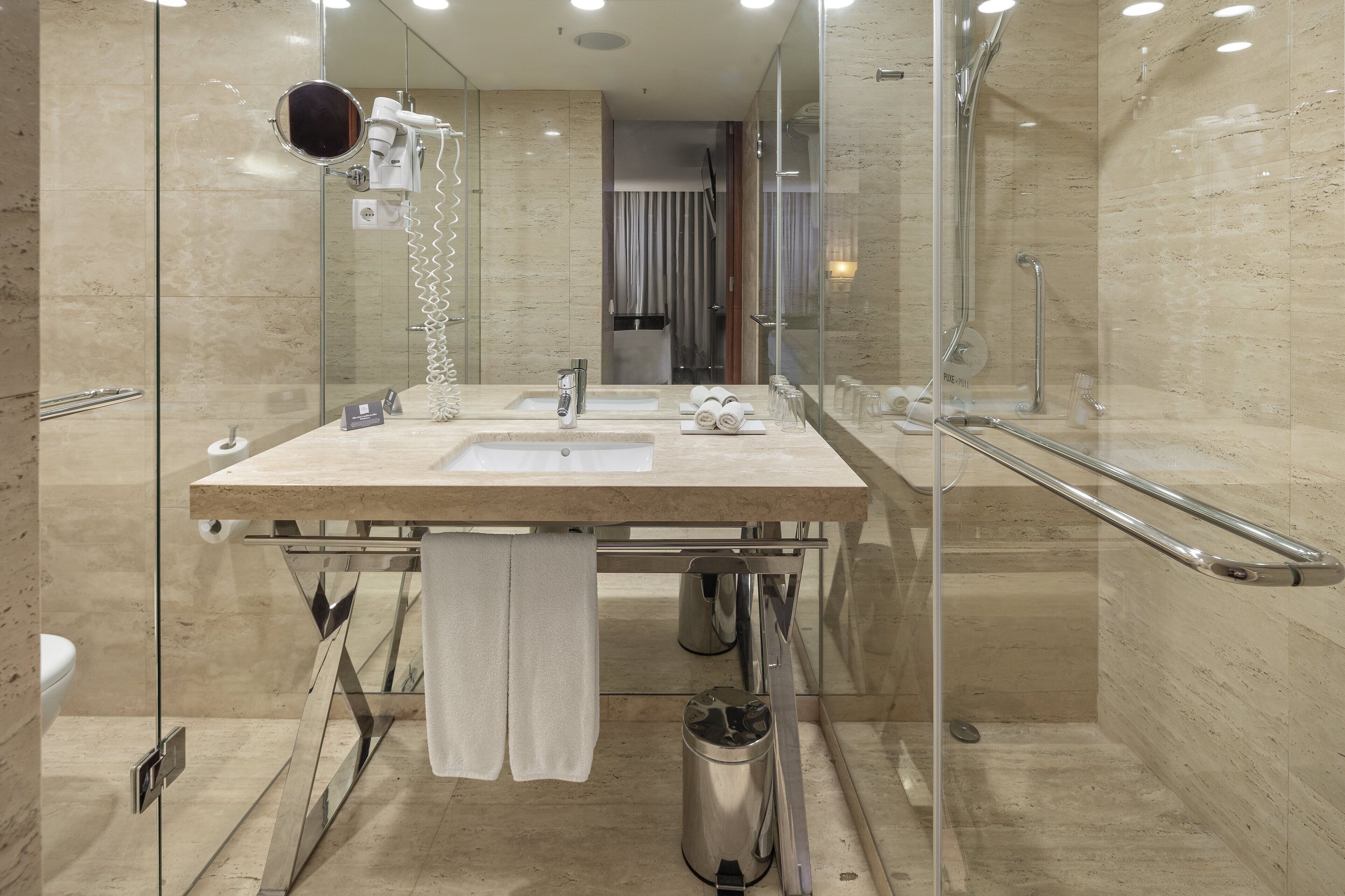 hair dryer, bathrobes, slippers, bidet