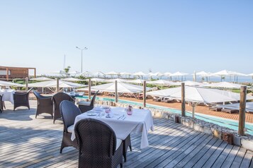 Breakfast, lunch, dinner served; alfresco dining