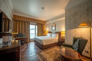 Premium bedding, pillow-top beds, minibar, in-room safe
