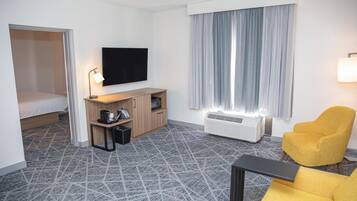 Suíte, 1 cama King, para não fumantes | Área de estar