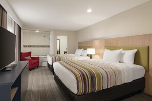 Suite, 2 Queen Beds, Non Smoking, Jetted Tub | Desk, blackout drapes, soundproofing, iron/ironing board