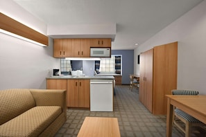 Studio Suite, 1 Queen Bed, Non Smoking | Desk, blackout drapes, iron/ironing board, free cribs/infant beds