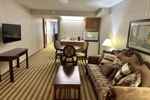 Suite, 1 cama King size, para no fumadores | Escritorio, espacio para trabajar con laptop y cortinas blackout