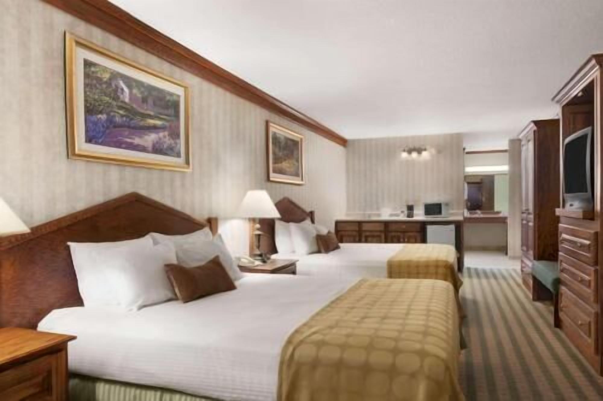 Desk, laptop workspace, blackout curtains, iron/ironing board