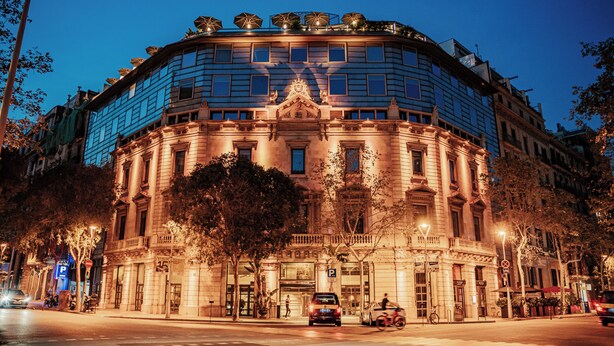 A historic building with a grand facade, large windows, and a prominent entrance. - Claris Hotel & Spa 5*GL, a Small Luxury Hotels of the World (Barcelona)