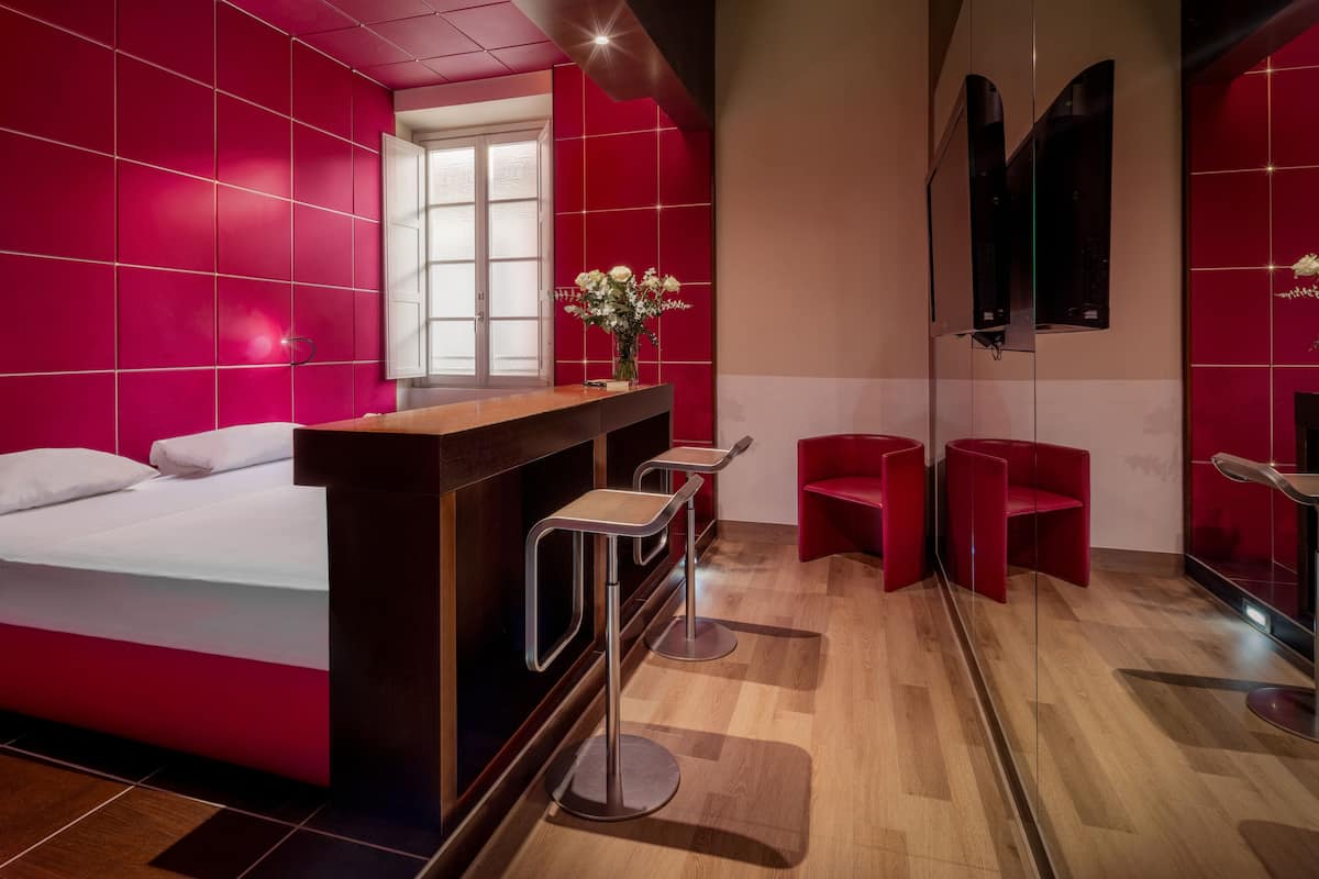 Premium bedding, pillow-top beds, minibar, in-room safe