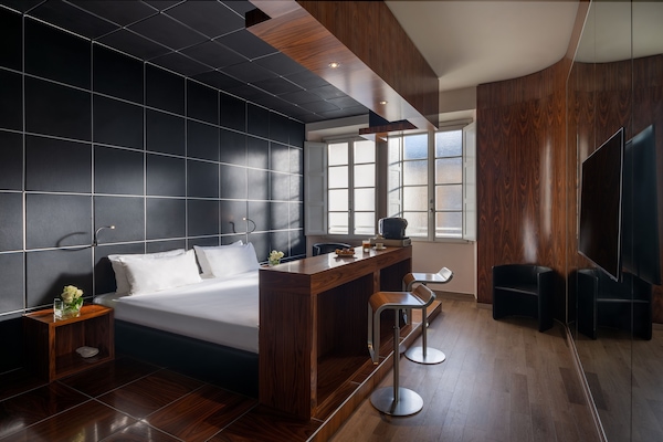 Ropa de cama de alta calidad, colchones con acolchado adicional, minibar