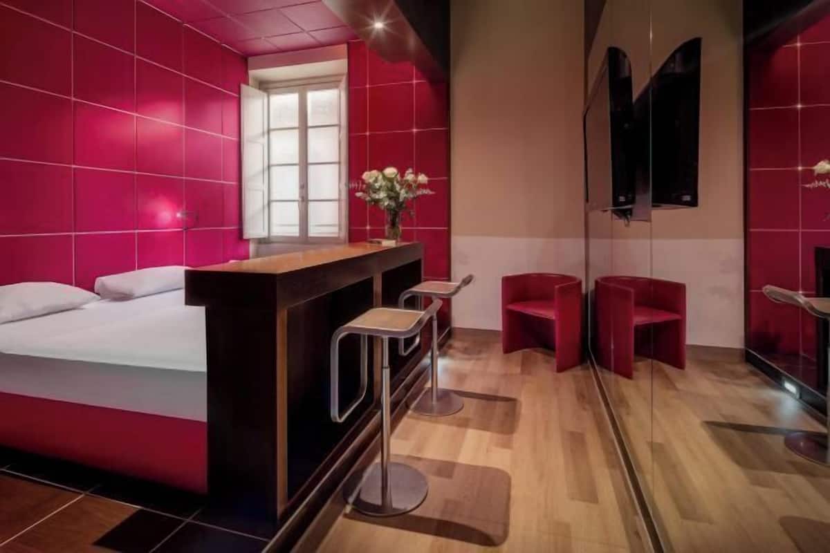 Premium bedding, pillow-top beds, minibar, in-room safe