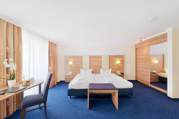 Hypo-allergenic bedding, minibar, in-room safe, desk