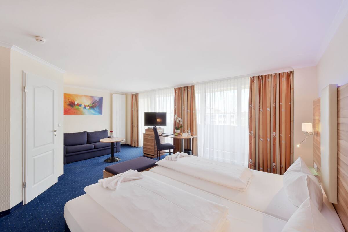 Hypo-allergenic bedding available, minibar, in-room safe, desk