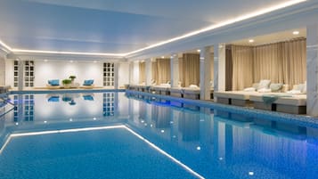 Indoor pool, seasonal outdoor pool, pool umbrellas, pool loungers