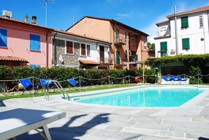 Seasonal outdoor pool, open 9 AM to 7 PM, pool umbrellas, sun loungers