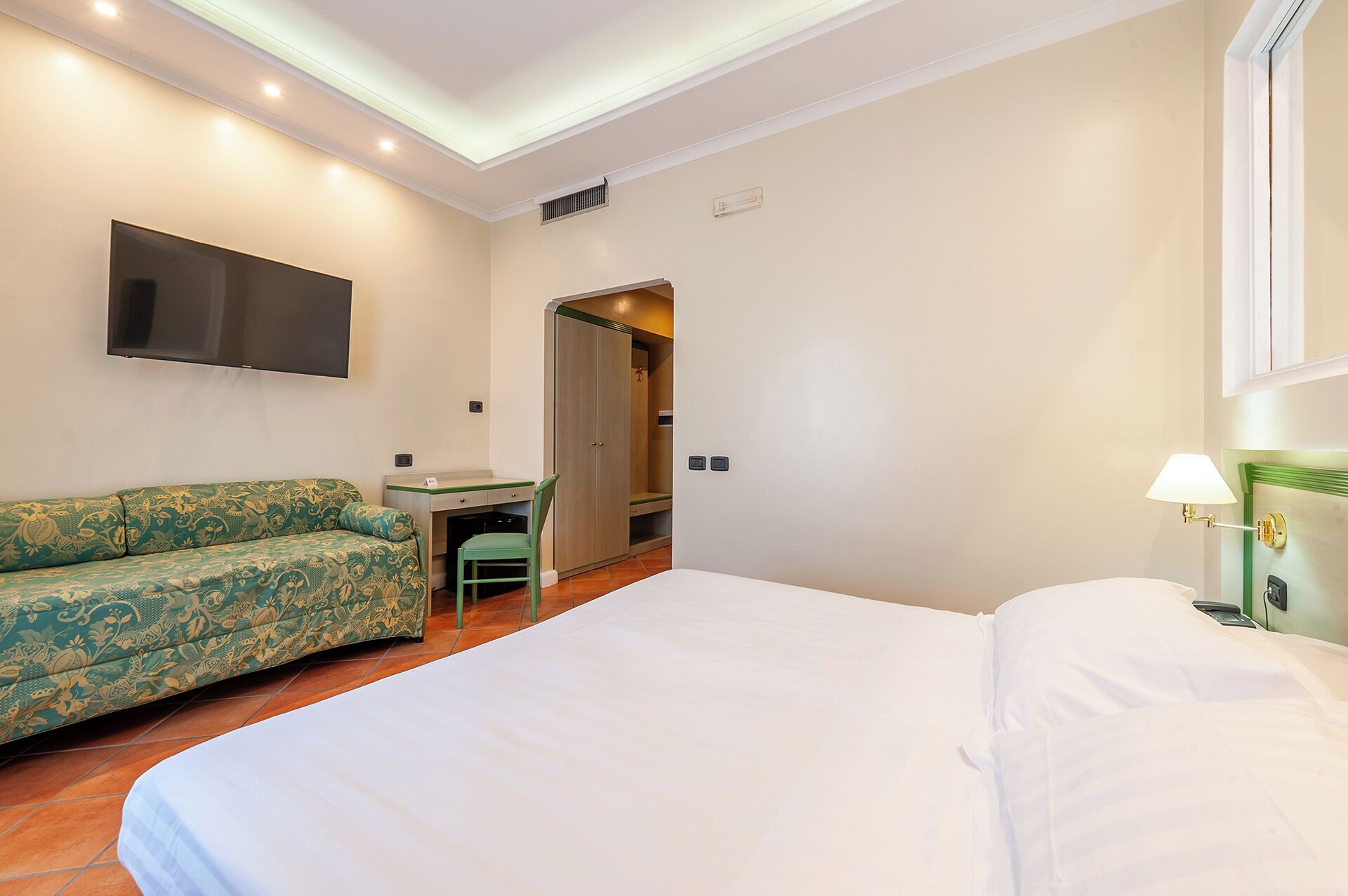 classic room, 1 king bed | in-room safe, desk, soundproofing, iron/ironing board