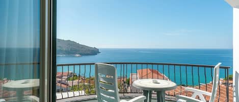 Family Room, Multiple Beds, Terrace, Sea View | In-room safe, desk, soundproofing, iron/ironing board
