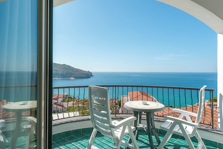 Family Room, Multiple Beds, Terrace, Sea View | In-room safe, desk, soundproofing, iron/ironing board