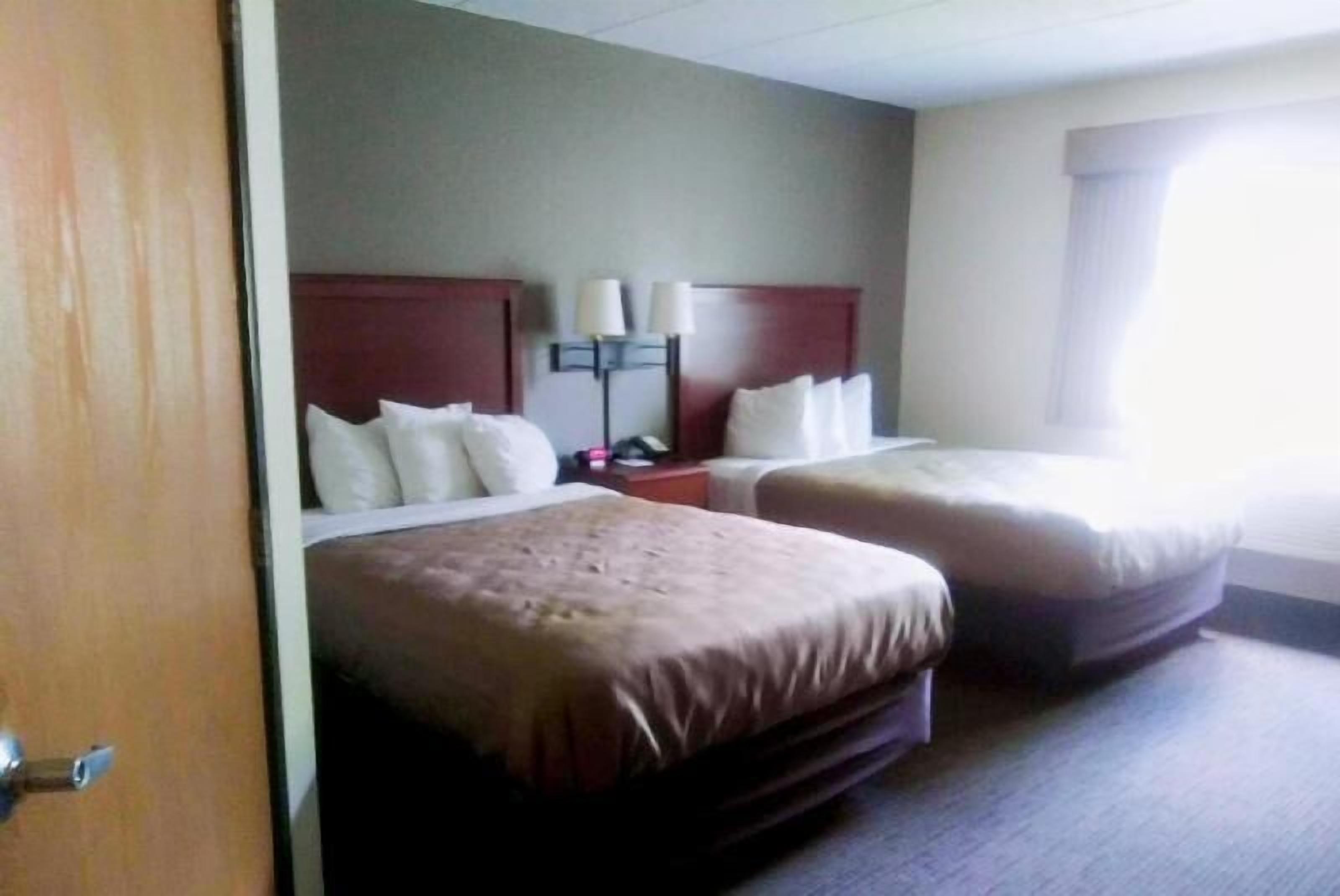 Desk, blackout curtains, iron/ironing board, free cots/infant beds