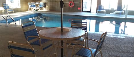 Indoor pool, open 6:00 AM to midnight, pool loungers