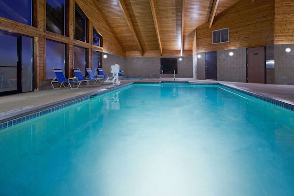 Indoor pool, open 6:00 AM to midnight, pool loungers
