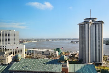 Hotel room view looking out at Loews New Orleans Hotel