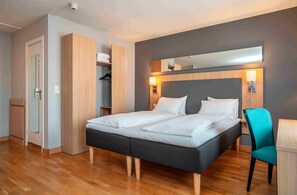 Pillow-top beds, minibar, in-room safe, desk