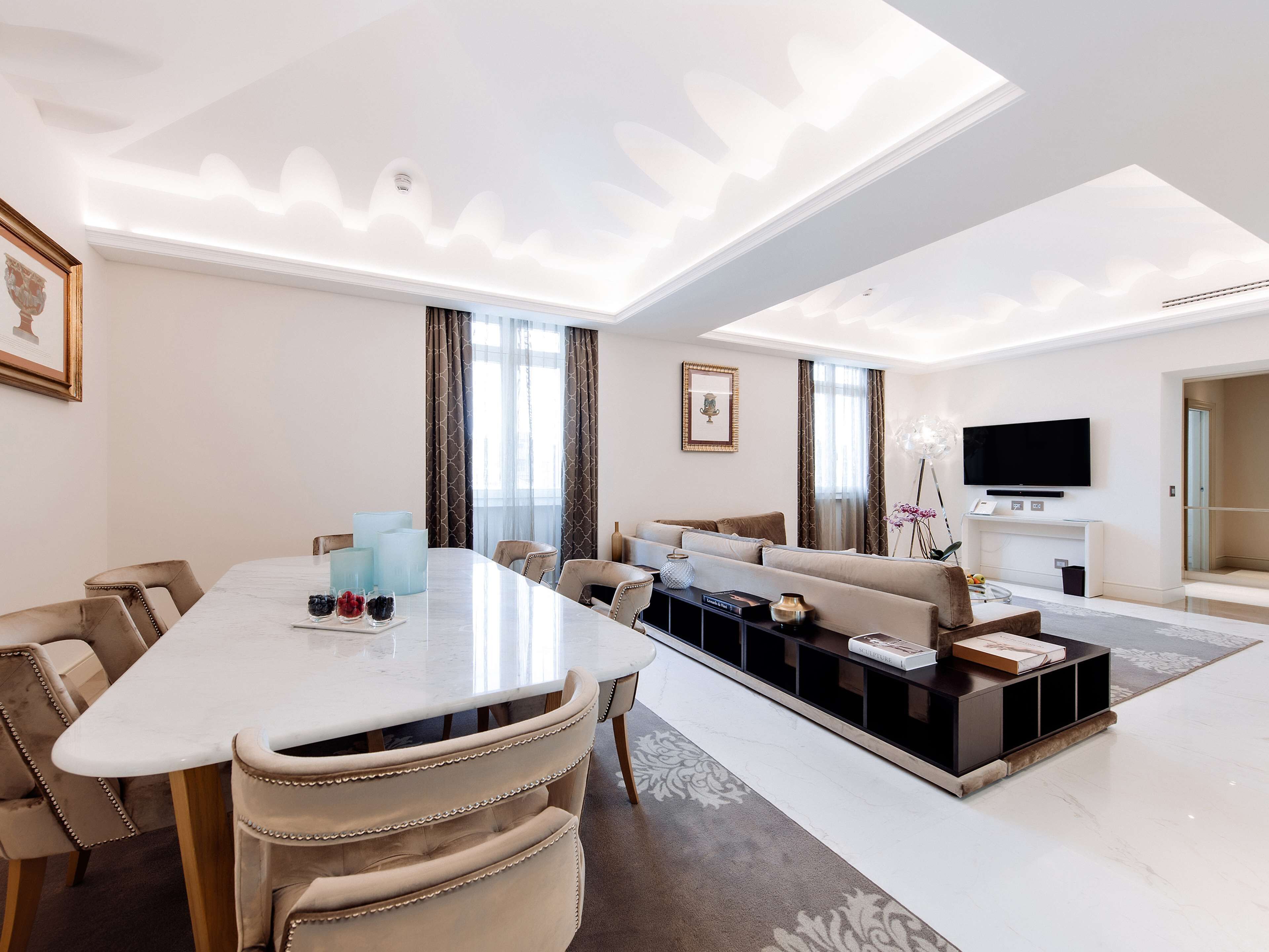 suite (basilio) | living area | 40-inch flat-screen tv with satellite channels, tv, pay films