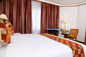 Ropa de cama de alta calidad y minibar 