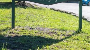 A sign for Coolfont Resort with amenities including registration, a restaurant, and lodging. - Coolfont Resort (Berkeley Springs)