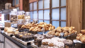Daily buffet breakfast (EUR 15 per person)
