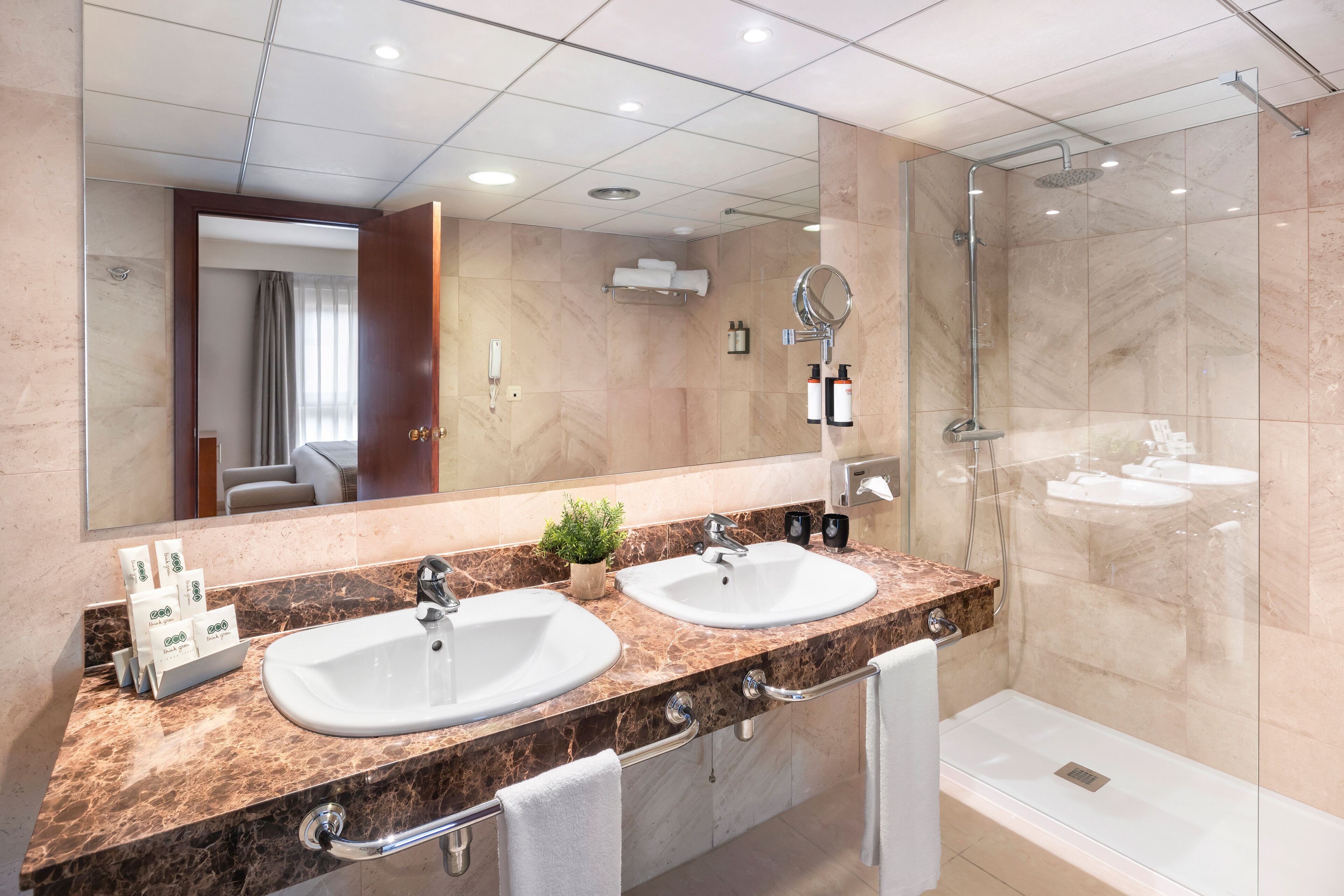 bathtub, hair dryer, towels